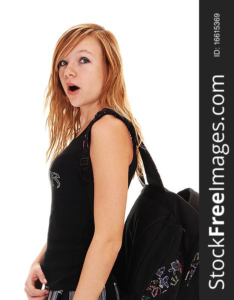 A young teenager with her back bag over her shoulder on the way to school, on white background. A young teenager with her back bag over her shoulder on the way to school, on white background.