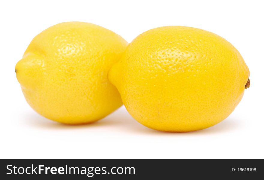Two juicy lemons isolated on a white background