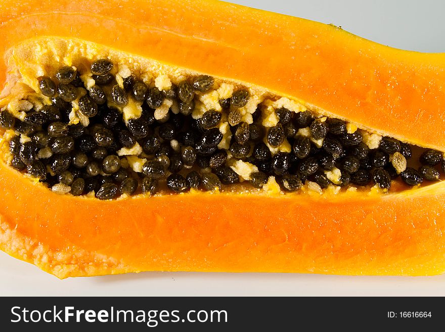 Very close up a half of papaya