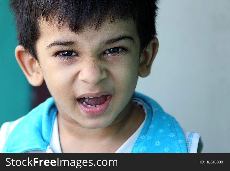 Indian Little Boy Screaming with expression