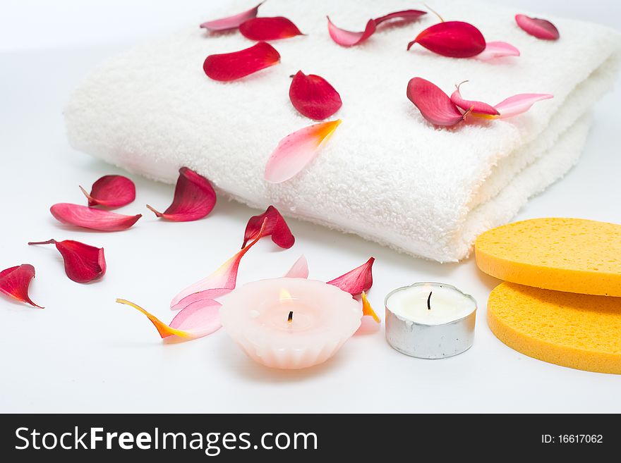 A set of aroma therapy beside the white towel. A set of aroma therapy beside the white towel