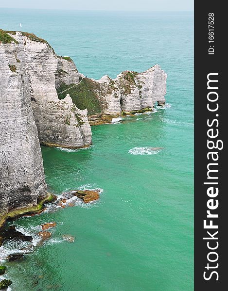 Cliffs in a sea of emerald