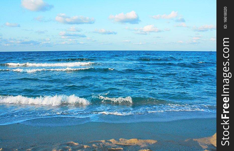 Beach And Cloudy Sky