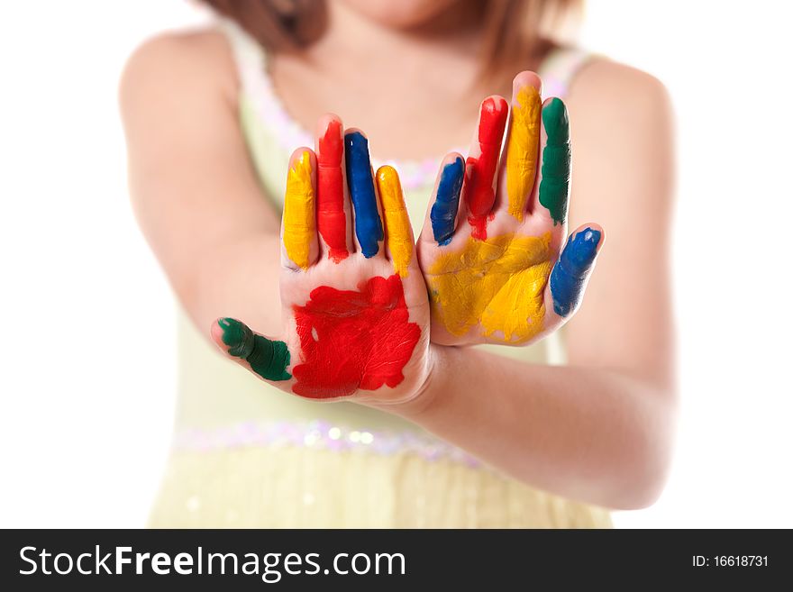 Little girl with hands painted in colorful paints ready for hand prints. Little girl with hands painted in colorful paints ready for hand prints