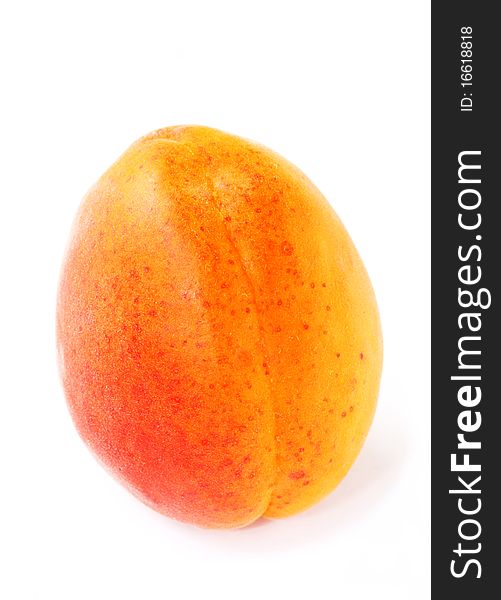 Fresh and ripe apricot isolated on a white background