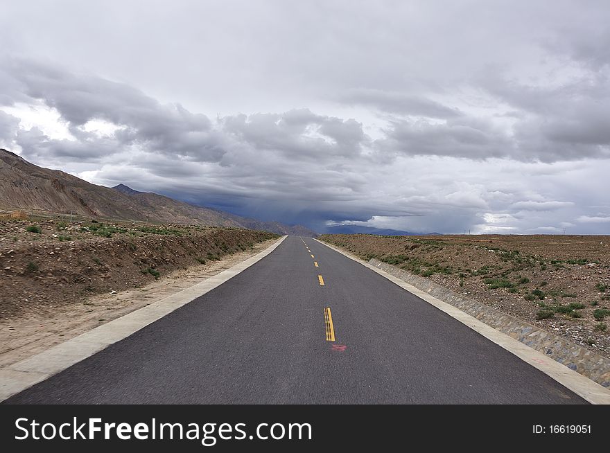 The highway of tibet is wide,open and opaque.What a beautiful landscape. The highway of tibet is wide,open and opaque.What a beautiful landscape.