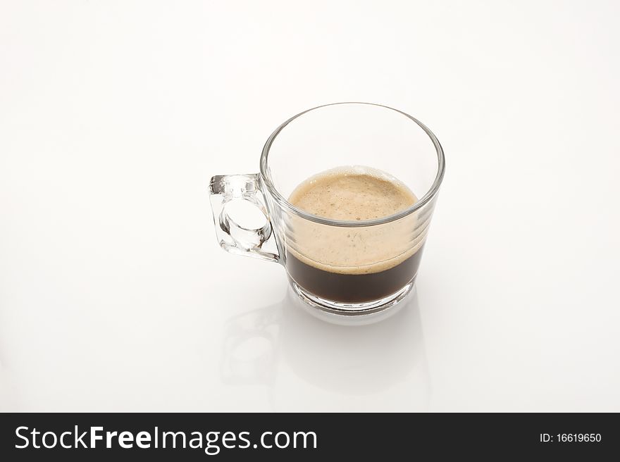 A cup of coffe espresso on white. A cup of coffe espresso on white