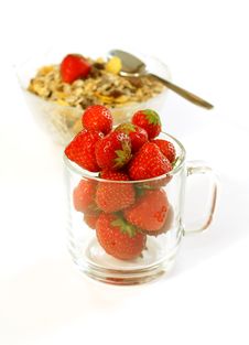 Strawberry In Glass And Muesli Isolated On White Royalty Free Stock Photography