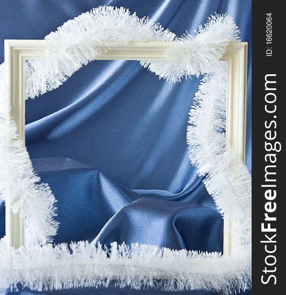 Satin background with Christmas decorations; place for your object