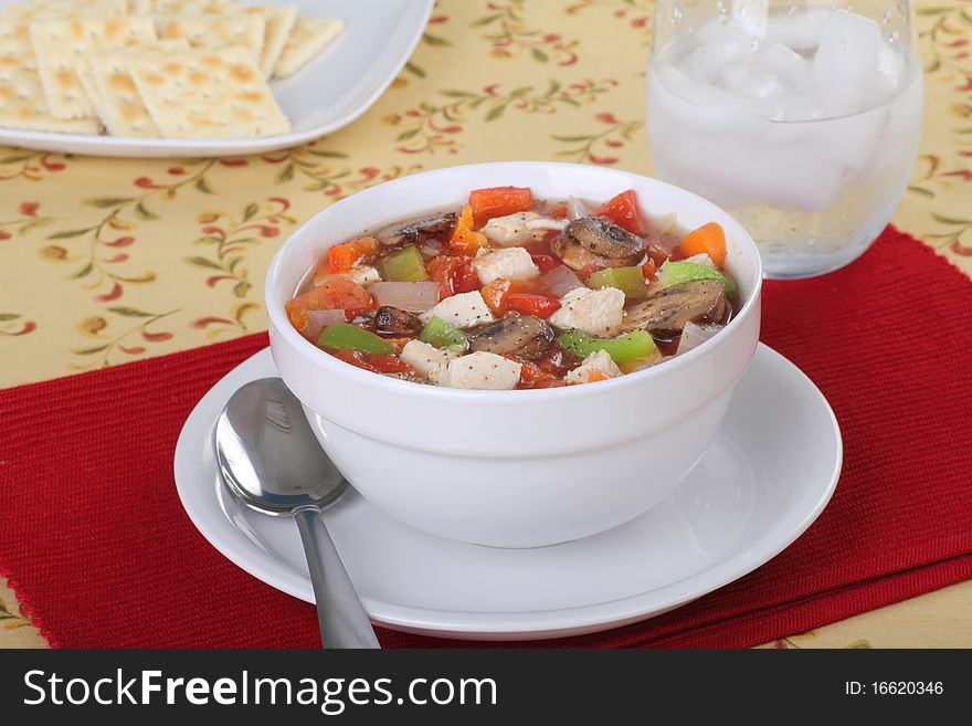 Chicken soup with with mushrooms, peppers, onions and carrots. Chicken soup with with mushrooms, peppers, onions and carrots