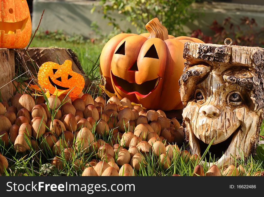 Halloween decoration with pumpkin and tree stump. Halloween decoration with pumpkin and tree stump.