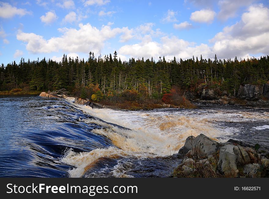 Wild and fast running water in the wilds of Newfoundland Canada. Wild and fast running water in the wilds of Newfoundland Canada.