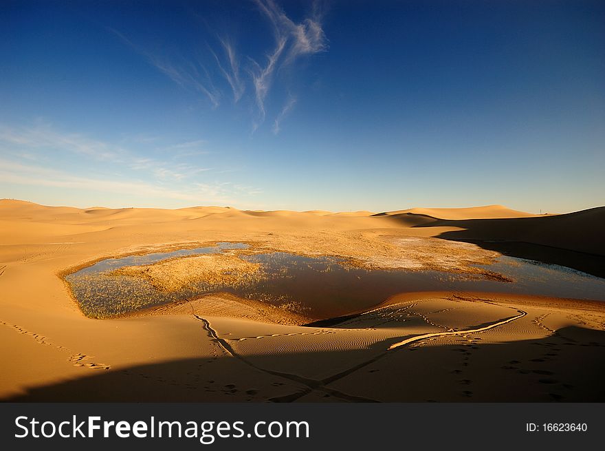 Lake in Badanjilin Desert, China