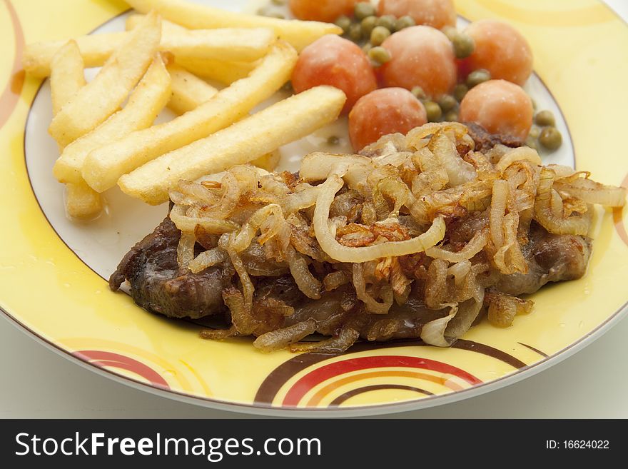 Chop with onions and Fries