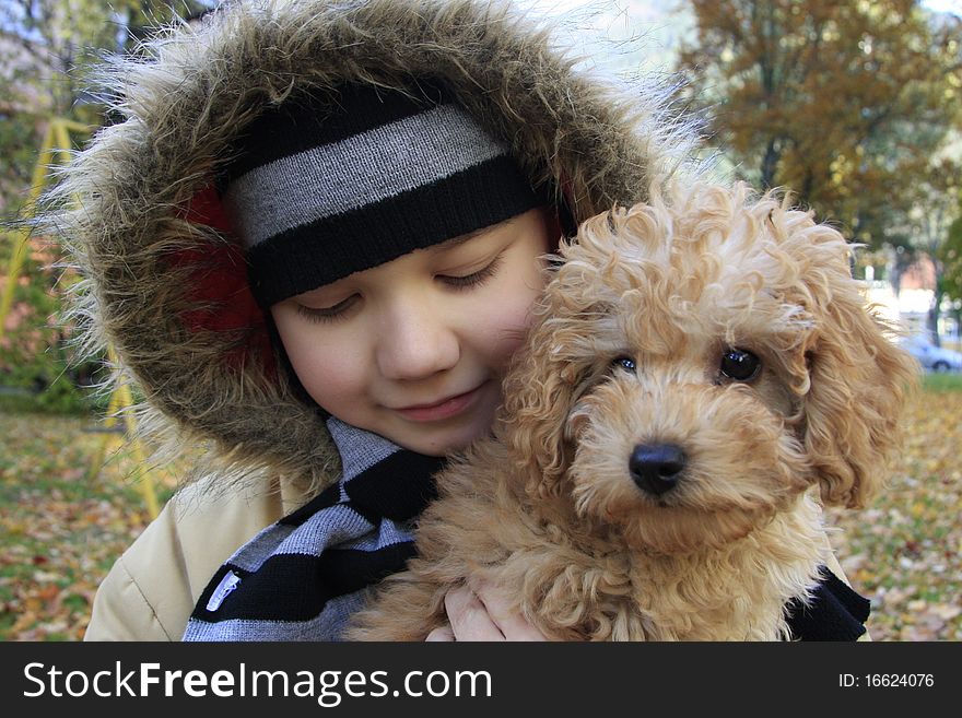 Boy and small dog