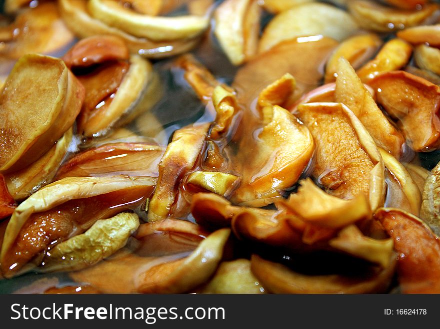 Background with compote from dried apples. A theme of preparation of meal.