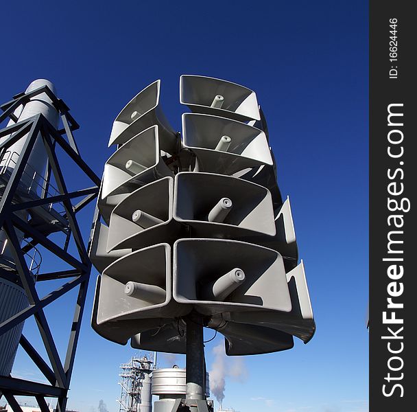 Isolated loudspeakers natural blue background