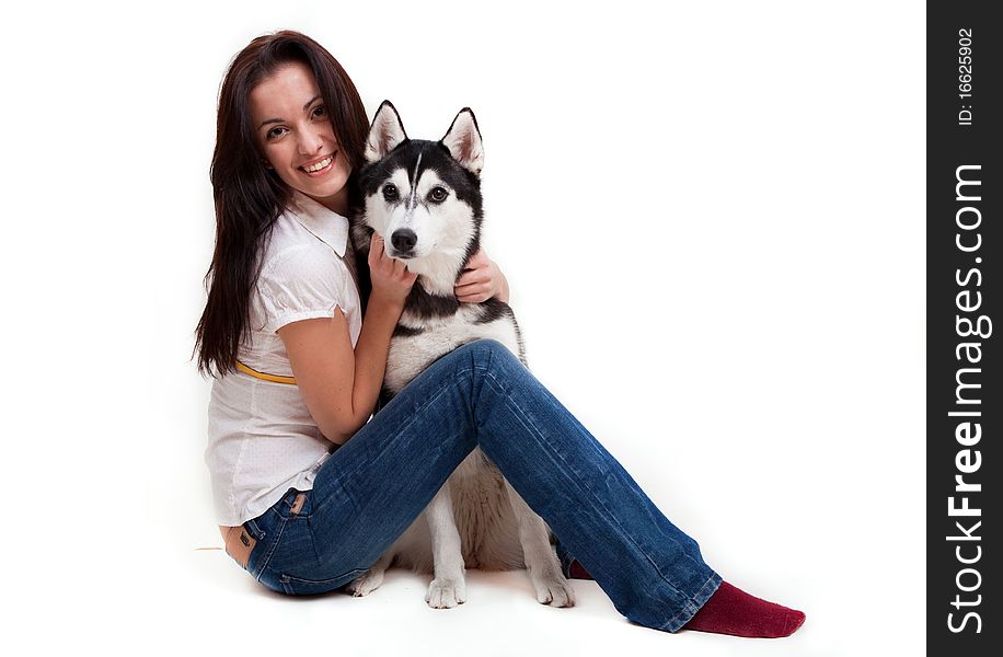 Portrait of beautiful girl with dog isolated on white