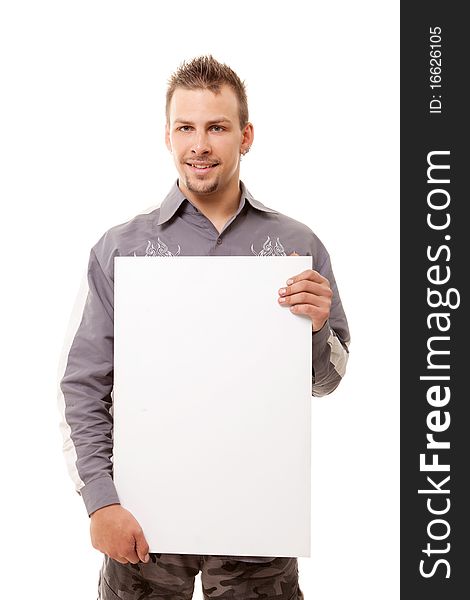 Smiling young handsome man with white clear vertical board on white background. Smiling young handsome man with white clear vertical board on white background