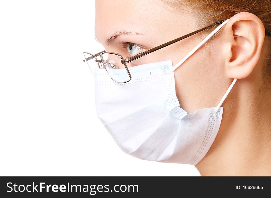 Female doctor portrait in mask and glasses over white