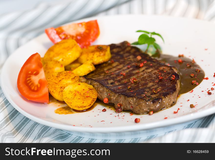 Steak with deep fried Potato . Steak with deep fried Potato .