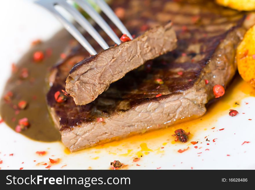 Steak with deep fried Potato . Steak with deep fried Potato .