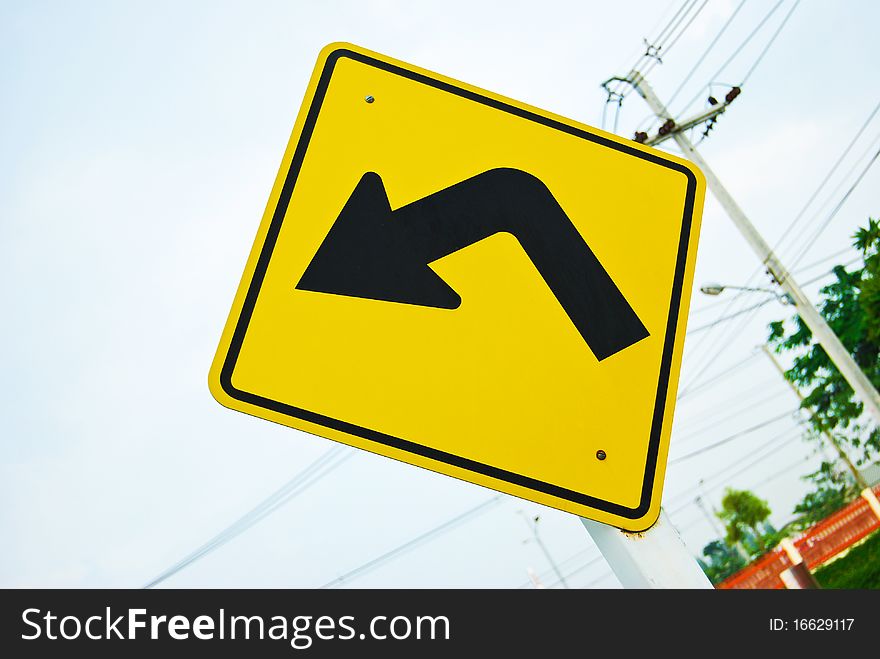 Turn left direction yellow traffic sign symbol. Turn left direction yellow traffic sign symbol