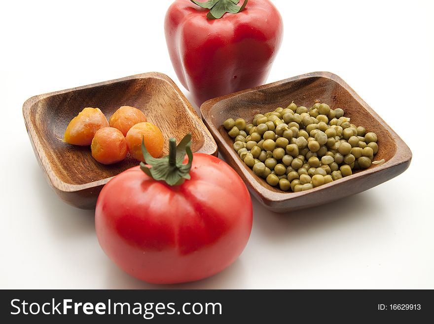 Peas and carrots with tomato and paprikas