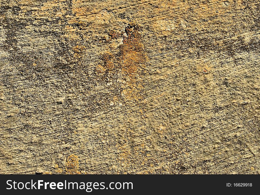 Old orange surface stone wall. Old orange surface stone wall