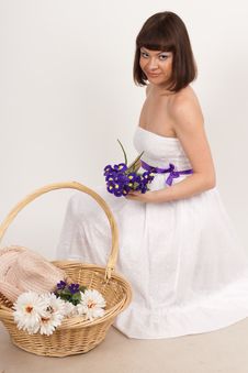 Beautiful Girl With Irises And A Basket Of Flowers Royalty Free Stock Images Beautiful Girl With Irises And A Basket Of Flowers Royalty Free Stock Images