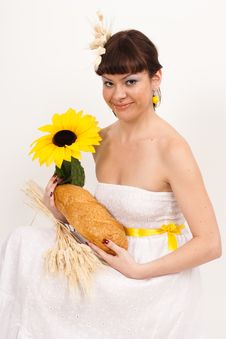Girl With Bread, Sunflower And Ears Of Wheat Royalty Free Stock Image Girl With Bread, Sunflower And Ears Of Wheat Royalty Free Stock Image