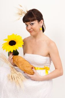 Girl With Bread, Sunflower And Ears Of Wheat Royalty Free Stock Photos Girl With Bread, Sunflower And Ears Of Wheat Royalty Free Stock Photos