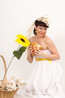 Girl With Bread, Sunflower And Ears Of Wheat Stock Photography Girl With Bread, Sunflower And Ears Of Wheat Stock Photography