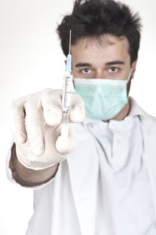 Male Doctor Holding A Syringe Stock Photography Male Doctor Holding A Syringe Stock Photography