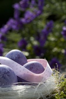 Easter Eggs In Purple With Ribbon Royalty Free Stock Photo