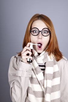Chill Red-haired Girl In Glasses With Spray. Stock Image Chill Red-haired Girl In Glasses With Spray. Stock Image