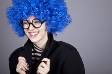 Funny Blue-hair Girl In Glasses And Black Coat. Stock Image Funny Blue-hair Girl In Glasses And Black Coat. Stock Image