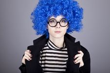 Funny Blue-hair Girl In Glasses And Black Coat. Stock Photography Funny Blue-hair Girl In Glasses And Black Coat. Stock Photography