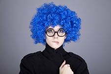 Funny Blue-hair Girl In Glasses And Black Coat. Royalty Free Stock Photos Funny Blue-hair Girl In Glasses And Black Coat. Royalty Free Stock Photos