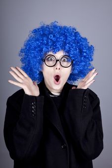 Funny Blue-hair Girl In Glasses And Black Coat. Stock Photos Funny Blue-hair Girl In Glasses And Black Coat. Stock Photos