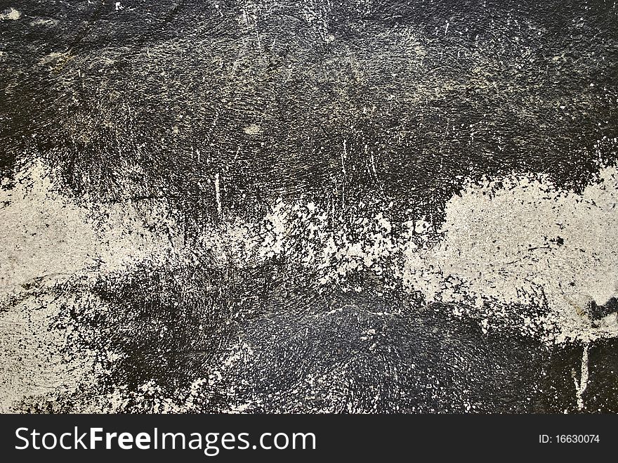 Old black surface stone wall. Old black surface stone wall