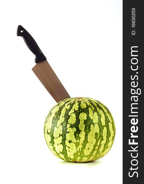 Watermelon with wolfed down with the knife on the white background. Watermelon with wolfed down with the knife on the white background