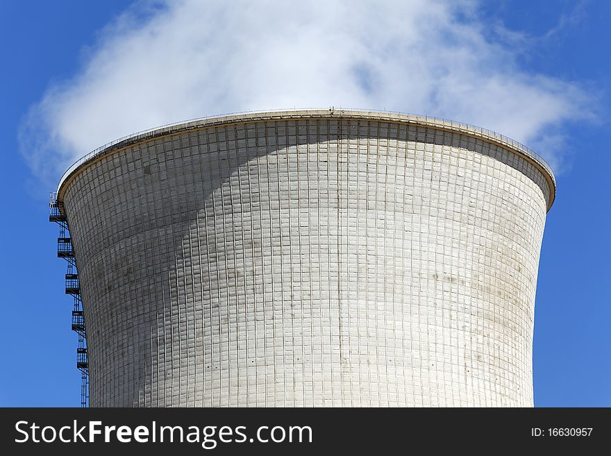 Chimney of nuclear industry and blue sky. Chimney of nuclear industry and blue sky