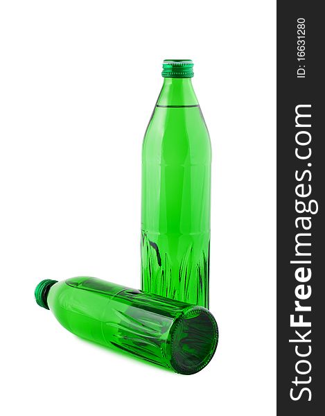 Water in bottles isolated on white. Clipping path. Water in bottles isolated on white. Clipping path.