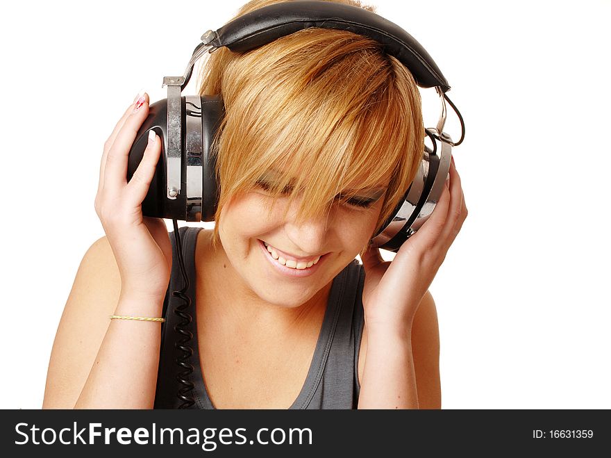 Portrait of happy girl with headphones against isolated white background