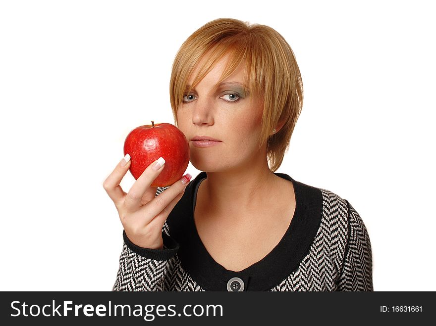 Redhead girl with red apple, focus on apple. Redhead girl with red apple, focus on apple