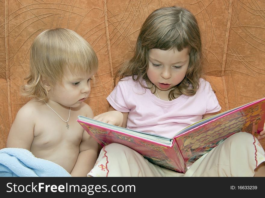 Children with interest read books. Children with interest read books