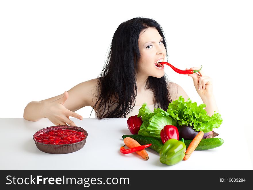 Beautiful woman with vegetables over white background. Beautiful woman with vegetables over white background