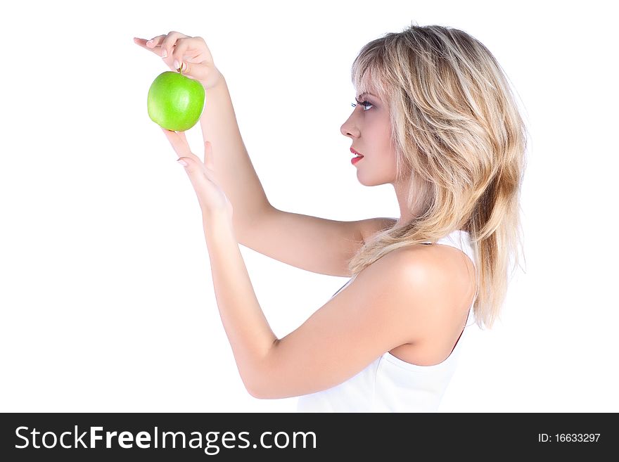 Young girl over white background with apple. Young girl over white background with apple