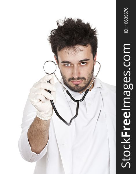 Young doctor holding a stetoscope isolated on white.